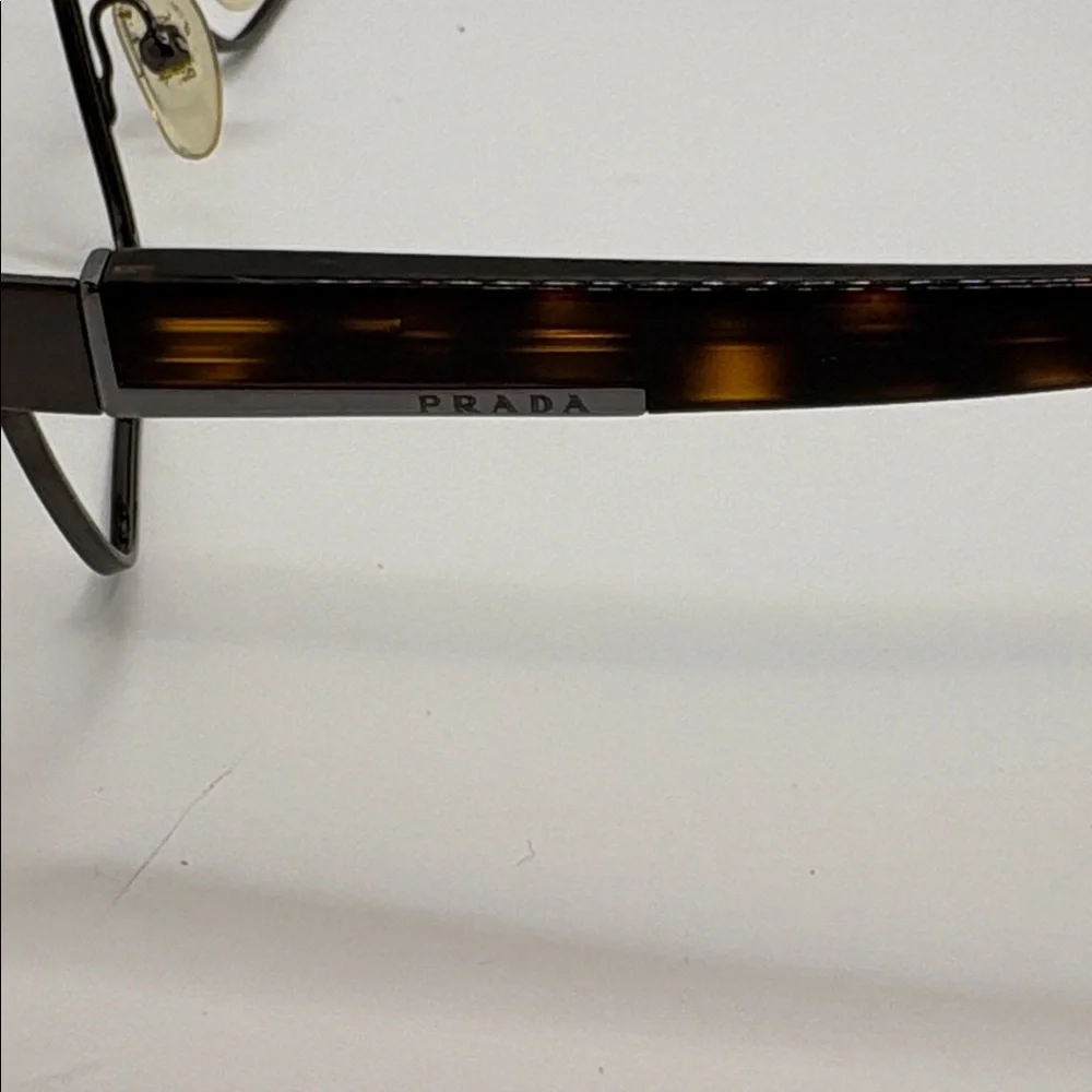 Women’s Prada tortoise shell eyeglass frames VPR 61P 53-16 LA8-101 140
